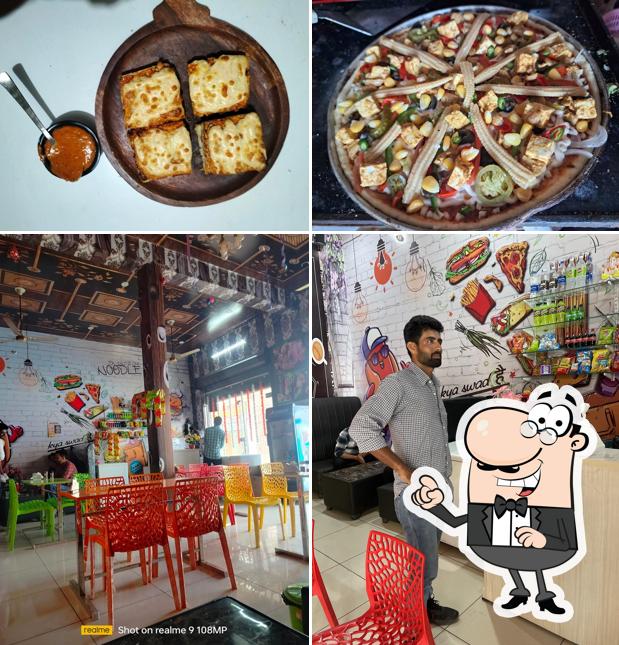 Among different things one can find interior and food at Godzilla Pizza