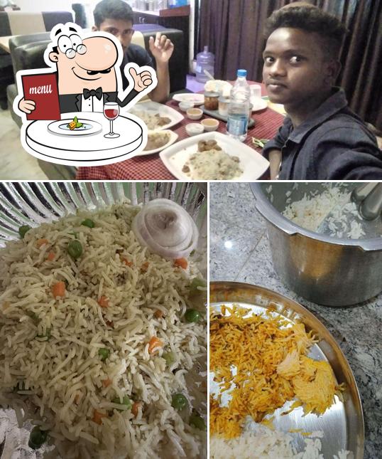 Check out the picture displaying food and interior at Green Chilly's