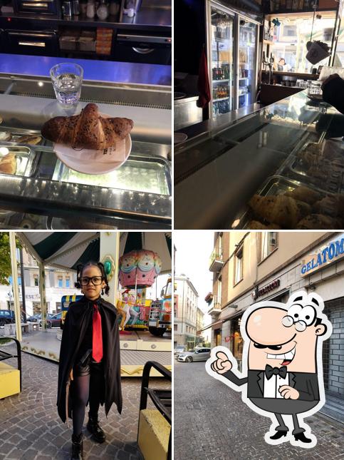 Questa è la immagine che raffigura la esterno e cibo di al VILLAGLORI