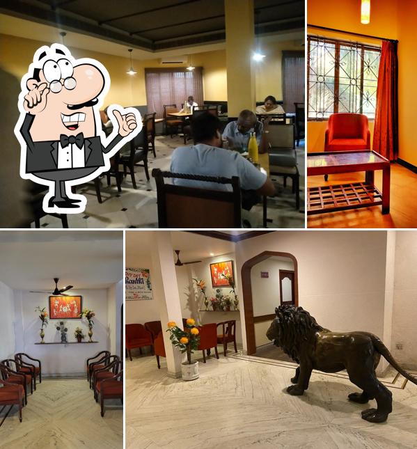Take a seat at one of the tables at Hotel Jayaram