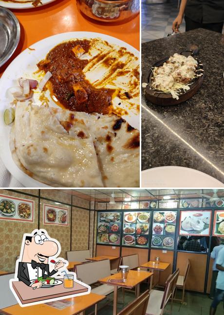 Among various things one can find food and interior at Spices Bravery pure veg and non veg restaurent