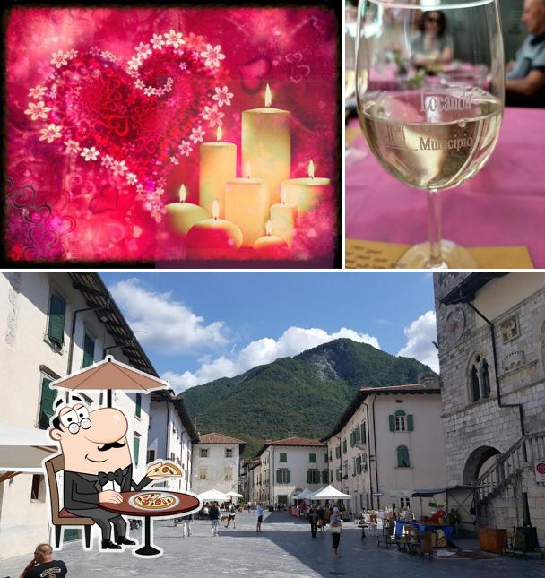 Puoi goderti l'aria fresca da seduto all'esterno di Ristorante La Locanda al Municipio