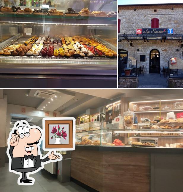 Siediti a un tavolo di Caffé Della Sosta