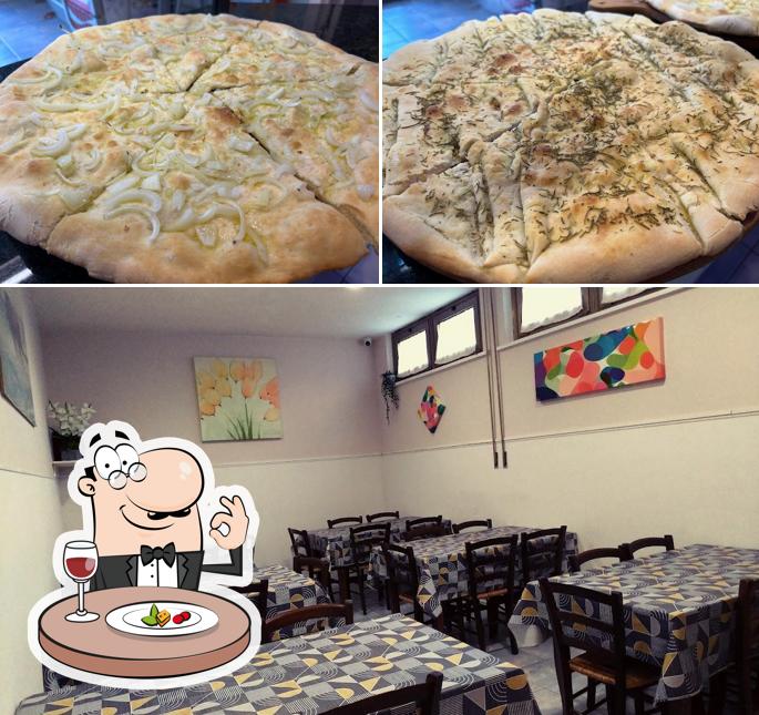La foto di cibo e interni da Pizzeria Le Ville Due