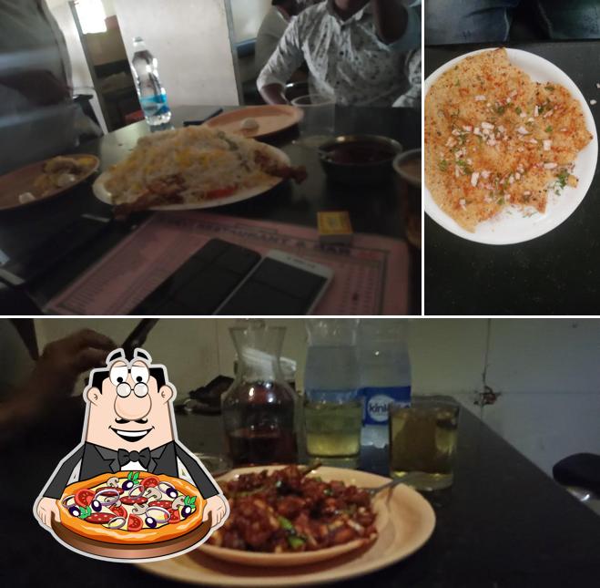 Get pizza at Devi Bar and Restuarant
