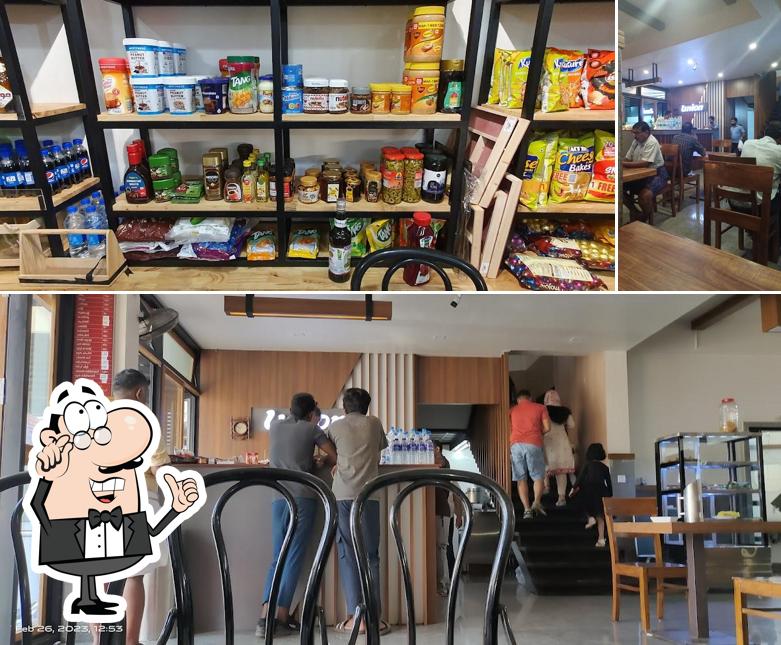 Take a seat at one of the tables at Union Restaurant, Nilambur