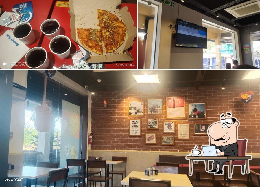 The image of interior and food at Domino's Pizza Verna, Goa
