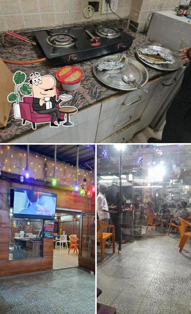 This is the picture displaying interior and beverage at Khana khazana Restaurant