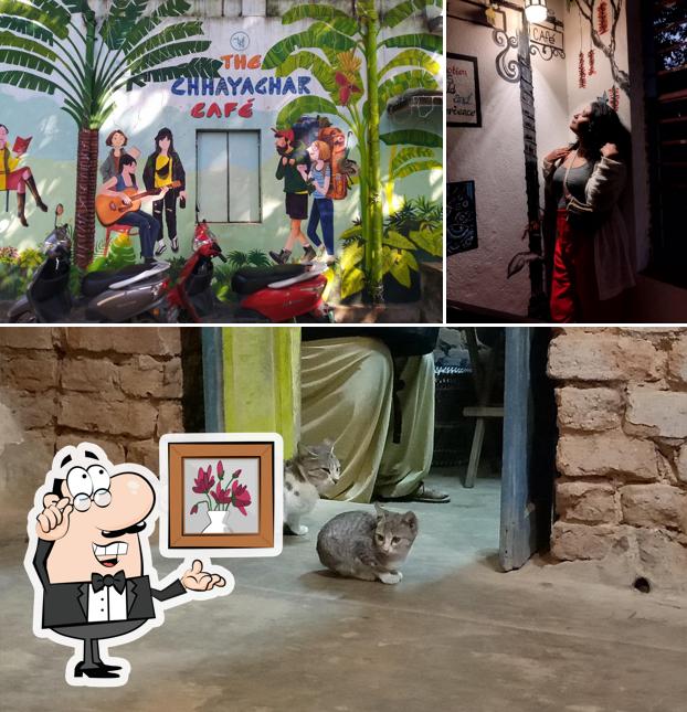 Take a seat at one of the tables at The Chhayaghar Cafe