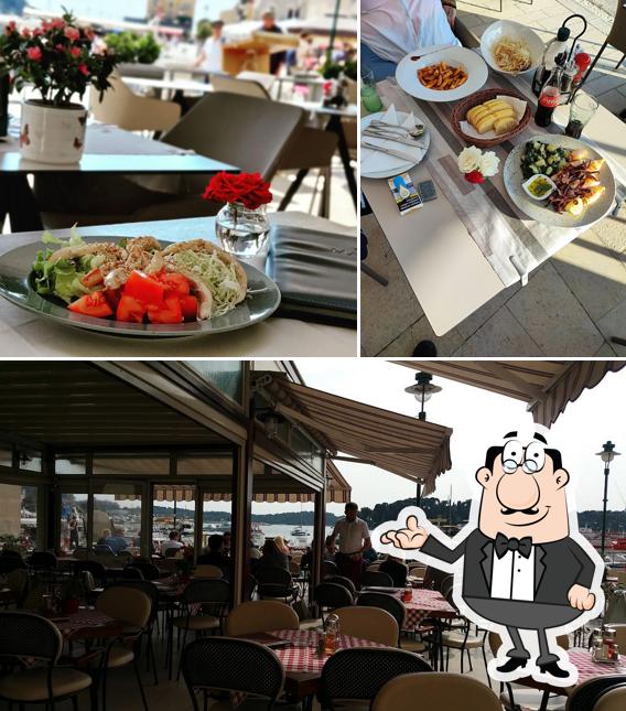 Siediti a un tavolo di Restaurant MARINA