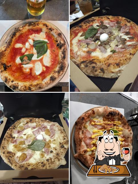 Prenditi una pizza a Pizzeria Gourmet Totò E Peppino