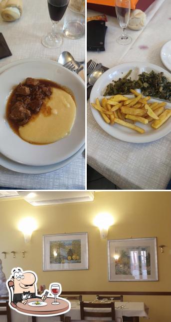 Questa è la foto che presenta la cibo e interni di Trattoria Sotto La Torre