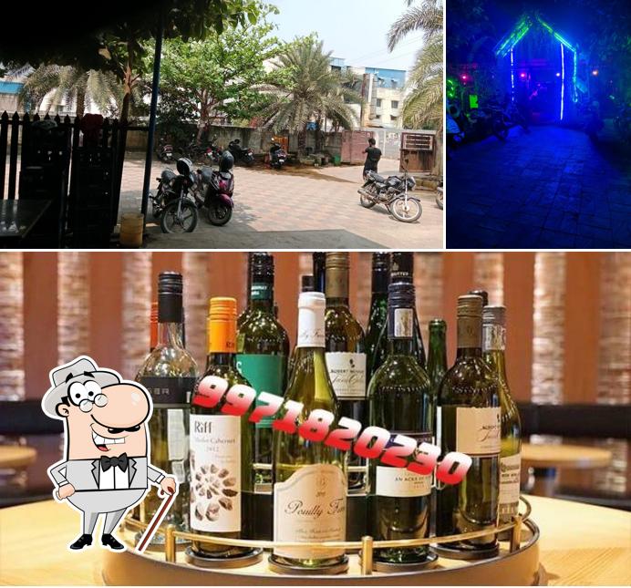 Among different things one can find exterior and beverage at TASMAC Wine Shop