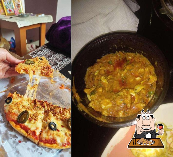 Get pizza at Norla Bar & Restaurant