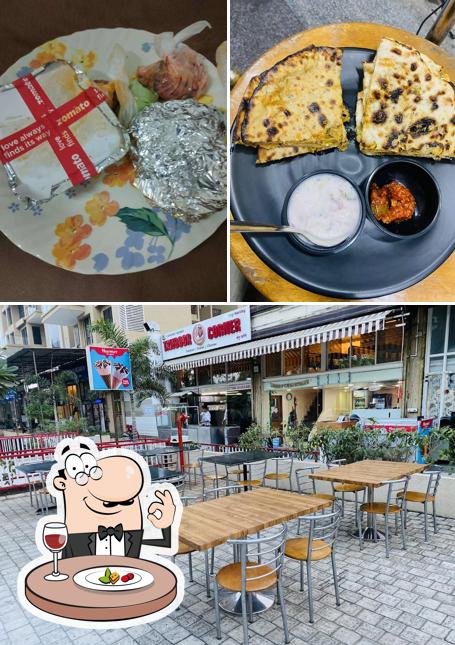 Check out the photo depicting food and interior at Tandoor Corner