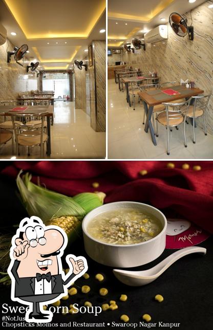 The picture of interior and beverage at Chopsticks Momos