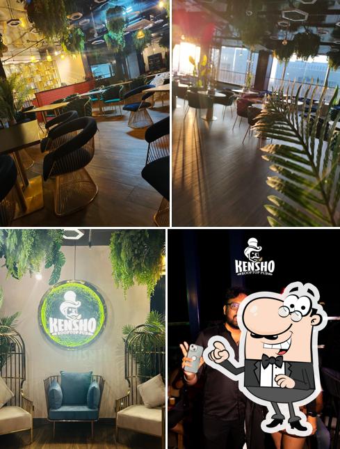 Take a seat at one of the tables at Kensho Rooftop Pub