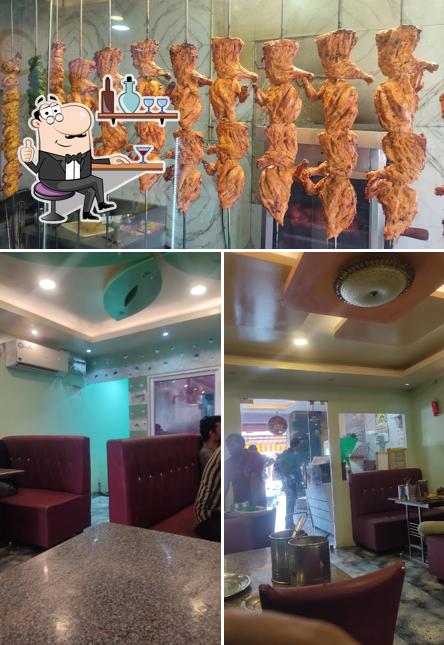 The photo of interior and food at A. R Biriyani Centre