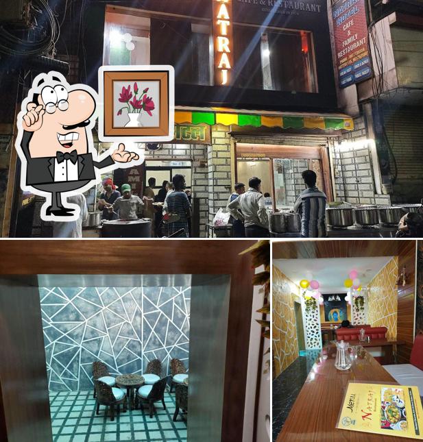 Take a seat at one of the tables at Natraj hotel