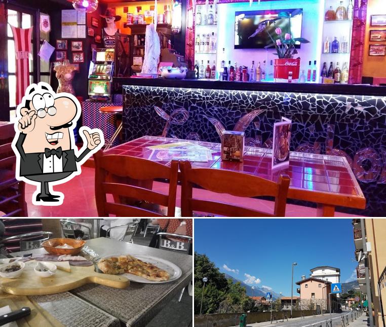 Questa è la foto che presenta la interni e esterno di Ristorante Pizzeria I Tre Archi