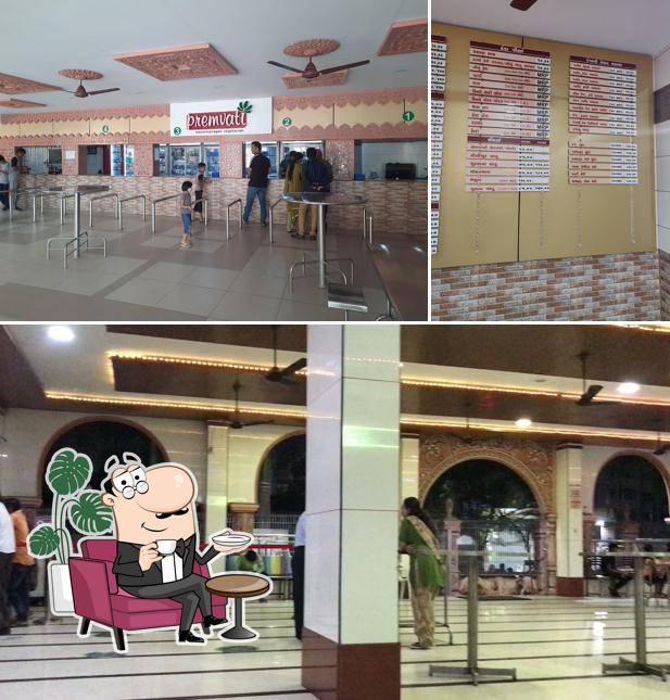 Take a seat at one of the tables at Premvati Food Court