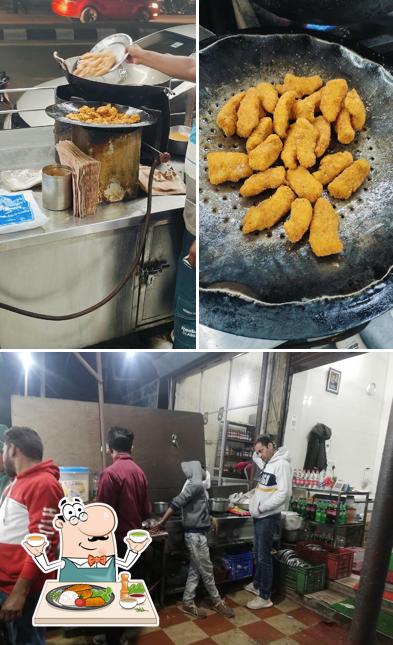 This is the picture displaying food and exterior at Makhan Fish Corner