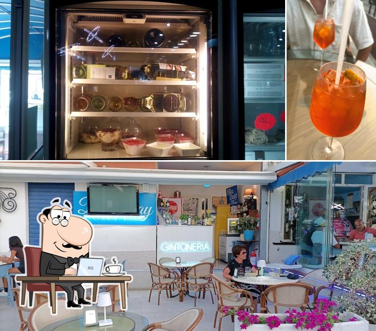 Questa è la immagine che presenta la interni e bevanda di Bar Blu Day