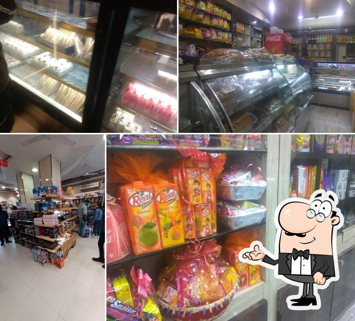 Take a seat at one of the tables at Fancy Bakery - Cake Delivery and Customised cakes Jalandhar