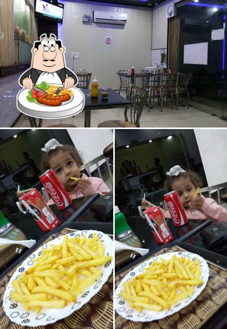 This is the image showing food and interior at Munchies Restaurant
