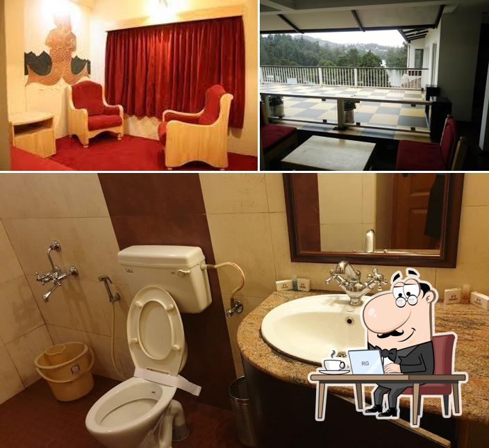 Take a seat at one of the tables at Hotel Darshan