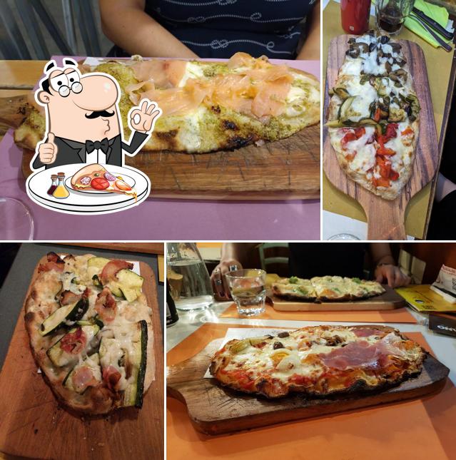 A Pizzeria Il Grano, puoi assaggiare una bella pizza