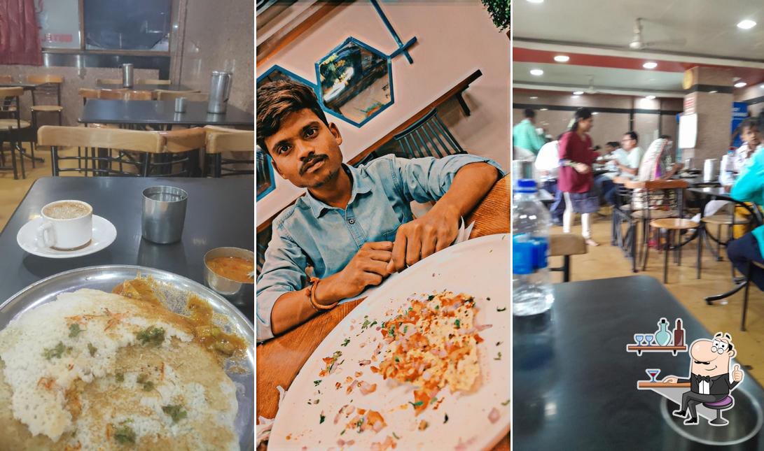 Take a seat at one of the tables at Hotel Kamal