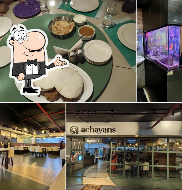 Take a seat at one of the tables at Hotel Achayans