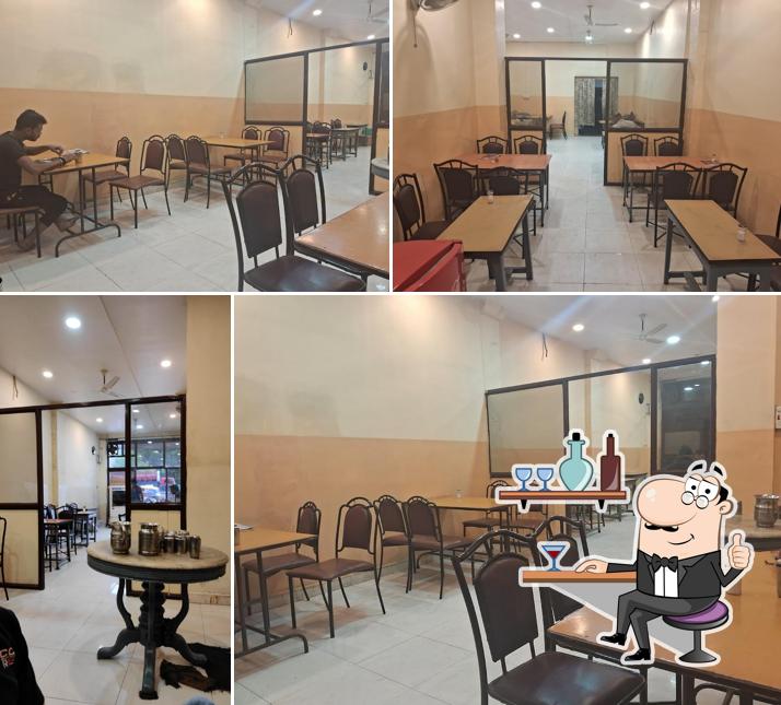 Take a seat at one of the tables at Gopal Bhojnalaya