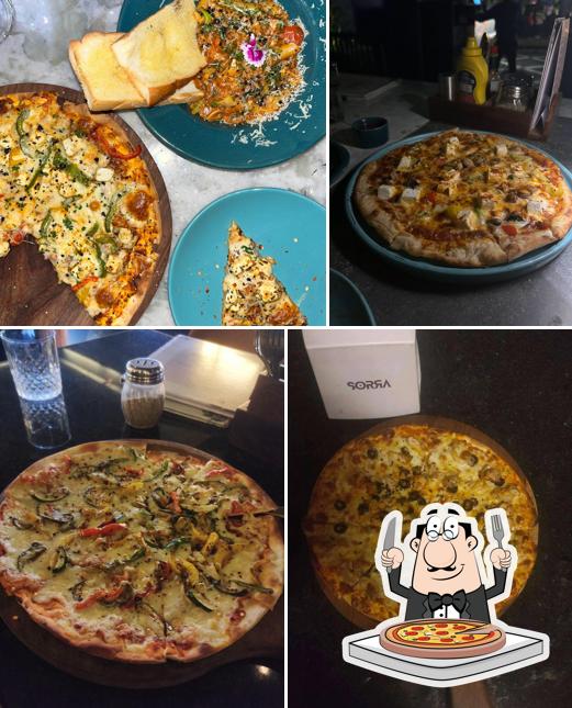 Try out pizza at Sorra Delhi