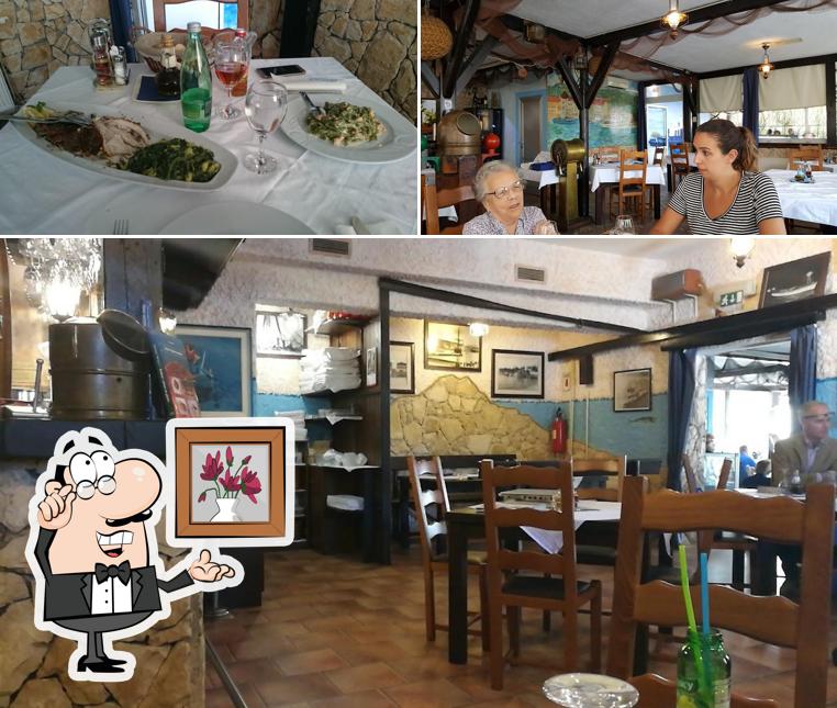 Siediti a un tavolo di Seafood Restaurant "Ugor"