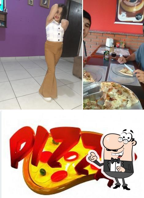 O interior do Pizzaria Dona Pizza