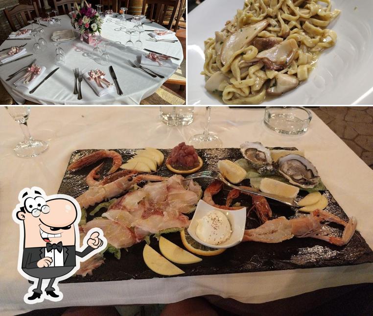Questa è la foto che presenta la interni e cibo di Ristorante L'Altra Tappa