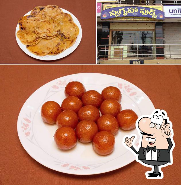 Check out the picture depicting interior and food at Swagrama Foods