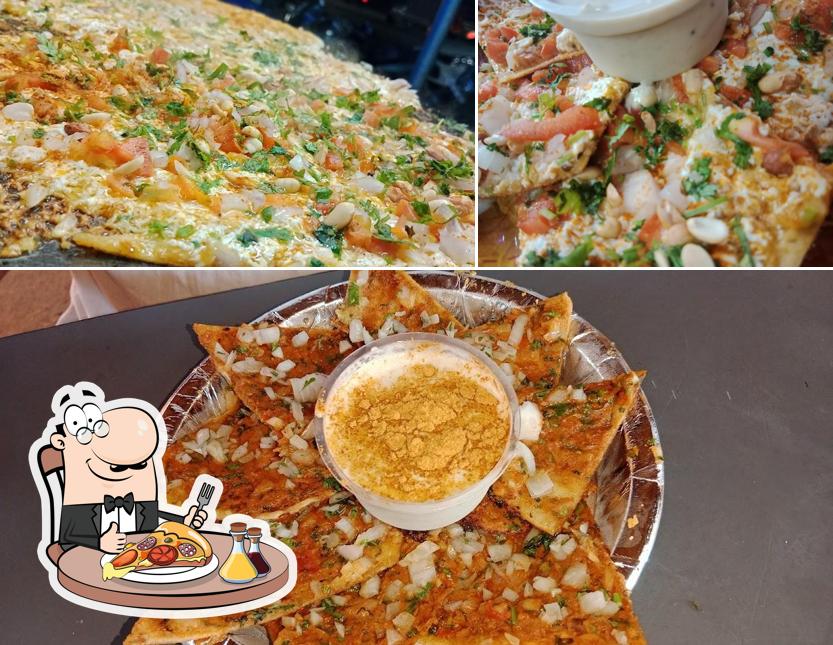 Order pizza at Jai Bhavani Tiffin Center