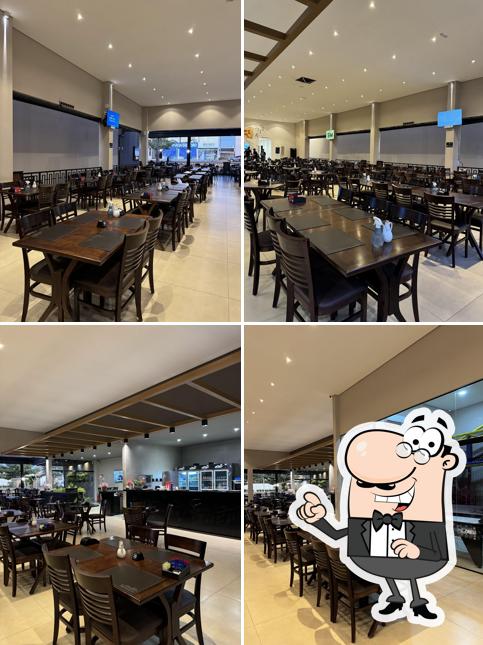 Sente em uma das mesas no Pizza Dom Rodrigo - Sinop