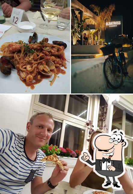 Puoi goderti l'aria fresca da seduto all'esterno di Albatross Pizzeria