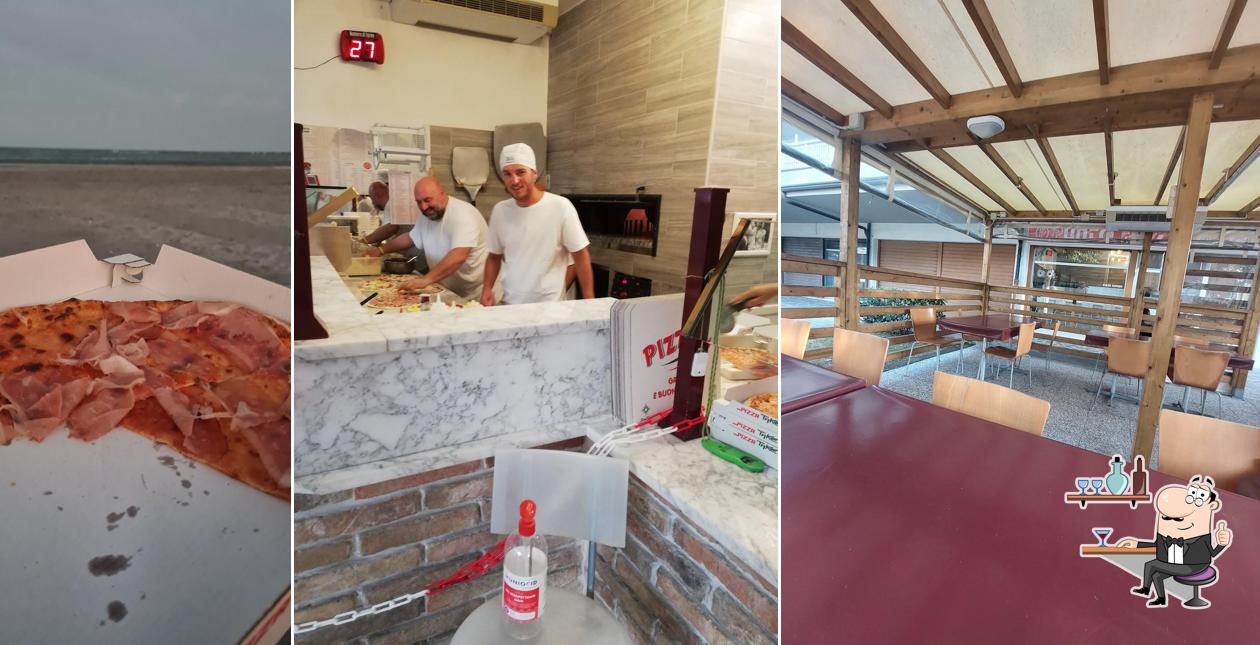 Siediti a un tavolo di Punto Pizza Siediti a un tavolo di Punto Pizza