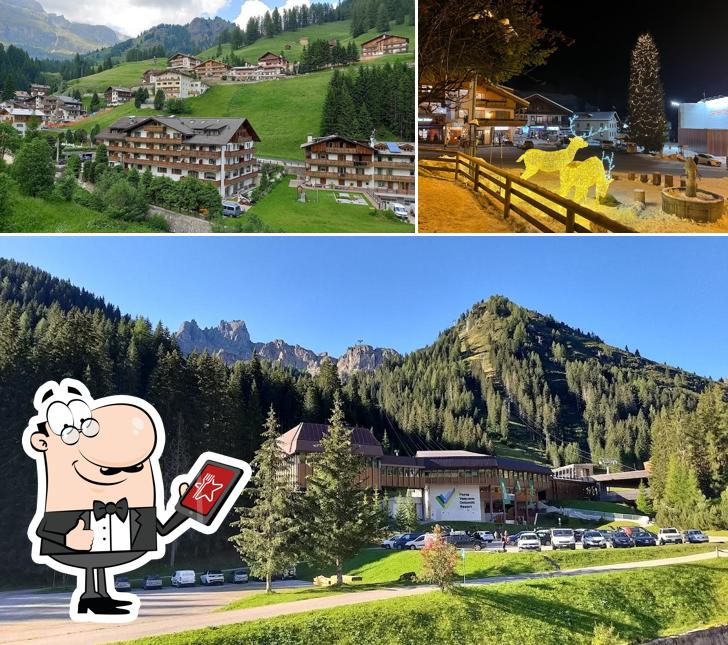 Curiosa tra la parte esterna di Active Hotel Malita - Arabba