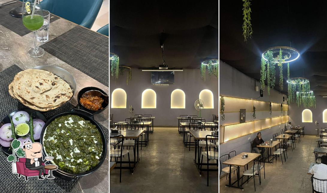 Take a seat at one of the tables at Hotel Milestone Family Restaurant And Bar