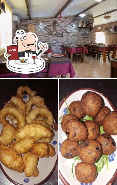 Questa è la immagine che presenta la cibo e interni di Locanda Tarallificio 5 Pani di Iaquinta Vincenza