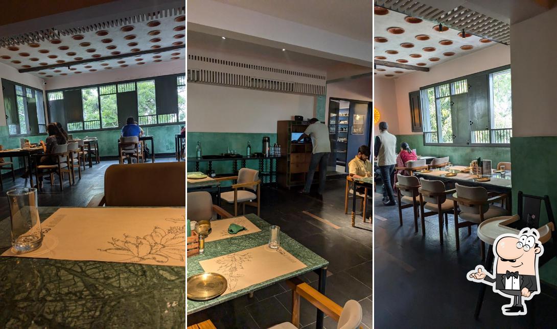 Take a seat at one of the tables at Kadali Kitchen