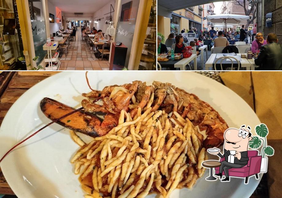 La immagine della interni e cibo di Manàmanà Ristorante