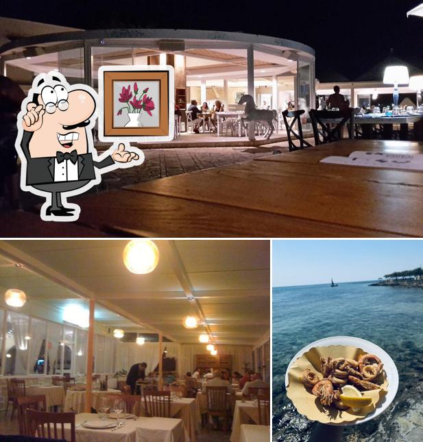 Dai un’occhiata alla foto che mostra la interni e cibo di Isola Beach