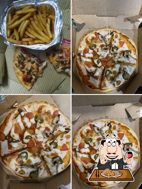 Get pizza at Pizza Hawkers